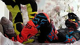 Gay biker treads boots in motocross