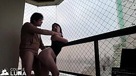 Naughty wife sucks big dick and gets pussy fucked on balcony for cum inside in public