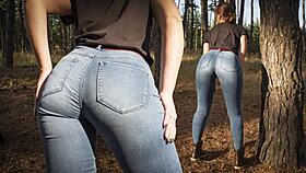 Hey, see this hot milf in tight jeans teasing her ass outdoors in woods