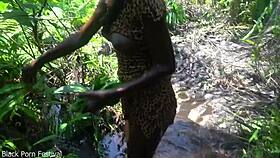 Two African tribal girls sneak off with the village chief for forest fun. Their skinny frames heat up the wild!