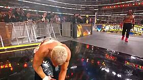 roman reigns battles cody rhodes for wwe title