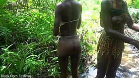 Two African tribal girls sneak off with the village chief for forest fun. Their skinny frames heat up the wild!
