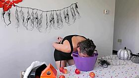 Bobbing for apples? Nah, just a bucket full of jizz!