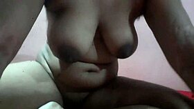 How old is this beauty with huge natural tits showing off at home?