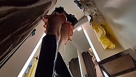 Can you spot the hidden camera in the dressing room as she tries on sexy clothes?