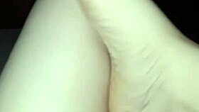 in the dark, this slutty barefoot babe gets her feet worshipped and licked all over