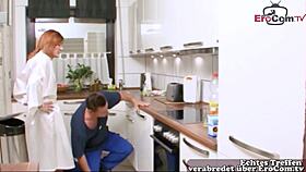 German housewife with red hair has sex in the kitchen
