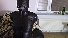 Katja the crossdresser is tied up and pleasuring herself
