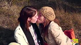 two brunette friends turn outdoor picnic into lesbian sex with strapon