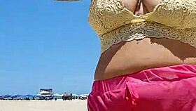 African babe flashes big pussy lips at beach lover