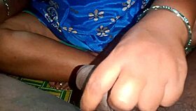 Beautiful girlfriend gives a good hand job to her boyfriend’s big cock