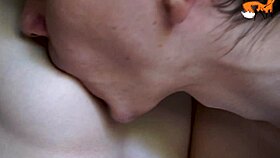 Close-up big tits licked with tongue on hard nipples