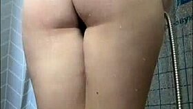 Sext teen 18+ shaving pussy in shower close up.