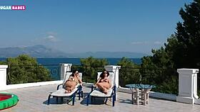 Oiled brunette lesbians rub their wet asses