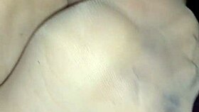 i'm giving a homemade footjob with sheer nylons, ahh