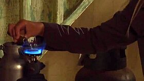 Horny madame fingers bent-over lesbian slave's wet pussy