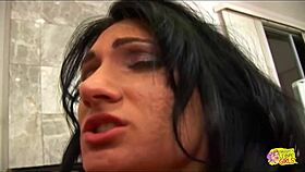 two brunettes share a dildo in a steamy session