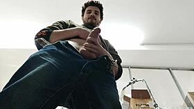 watch me sneak around the shop to jerk my big cock solo