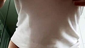 Watch this mature babe rip her wet t-shirt and masturbate!