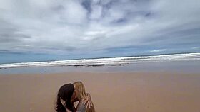 Friends fuck on beach admiring nature