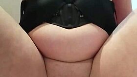 this lingerie babe masturbates hard with a buttplug for double penetration orgasm.