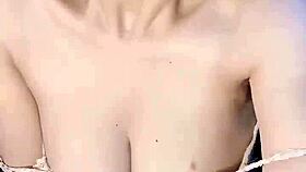 Glassed Vietnamese Girl Teases with Solo Play—What’s She Hiding?