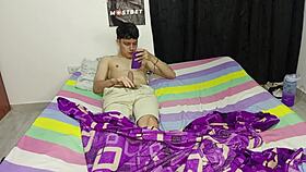 Young Colombian guy jerks off to porn on his phone, and his hot stepmom helps out 😏