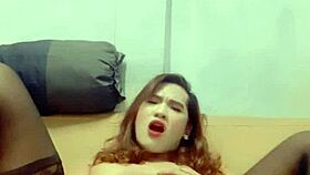 Watch ladyboy Mint stroke her cock and swallow her own sperm for you