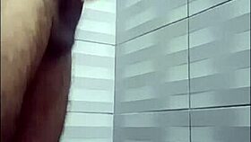 young guy masturbates huge cock in shower