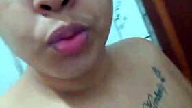 This depraved whore shows off her wet and succulent pussy