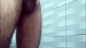 young guy masturbates huge cock in shower