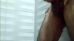 young guy masturbates huge cock in shower