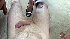 A dominant woman gives a rough shoejob with her feet on a cock in POV domination.