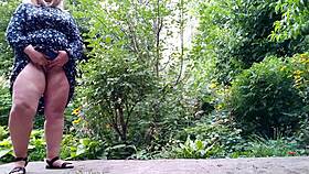 Sweet stepmom aids stepson with peeing outdoors in unique moment