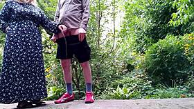 Sweet stepmom aids stepson with peeing outdoors in unique moment