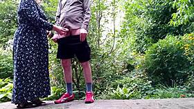 Sweet stepmom aids stepson with peeing outdoors in unique moment