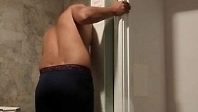 Enjoying a relaxing shower in the first part of the series.