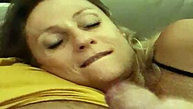 Blonde milf aline gives handjob to flavio before sleep