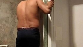 Enjoying a relaxing shower in the first part of the series.