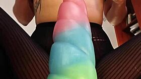she's riding the bad dragon dildo with her hairy wet pussy in close up