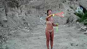 Amazing outdoor soap bubbles fun with naked mature milf wife!