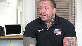 Sex addict gets blowjob from tattooed gay pornstar