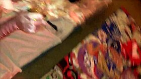 Sexy woman in dress, panties, heels, and stockings gives blowjob then doggystyle fucking