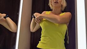 Big tits flash in dressing room with sexy see-through outfit on!