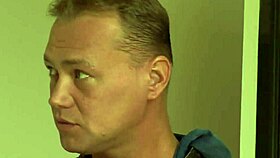 A beautiful girl is having sex with two cocks at once