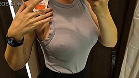Big tits flash in dressing room with sexy see-through outfit on!