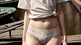 Lingerie models pose gracefully along Amsterdam canals