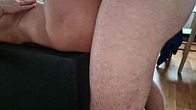 a naked milf lies on the floor in a scene