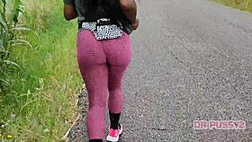 Ebony Prostitute With Big Ass In Leggings Runs Alone In The Forest.