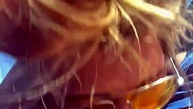 Blonde woman receives facial in public setting